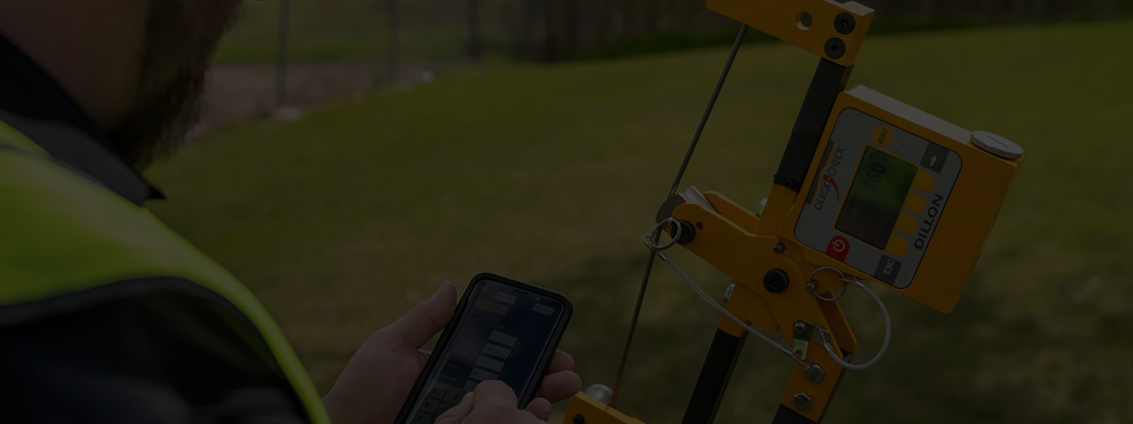 Utility service worker using force measurement products and cable tension meters for accurate, compliant measurements